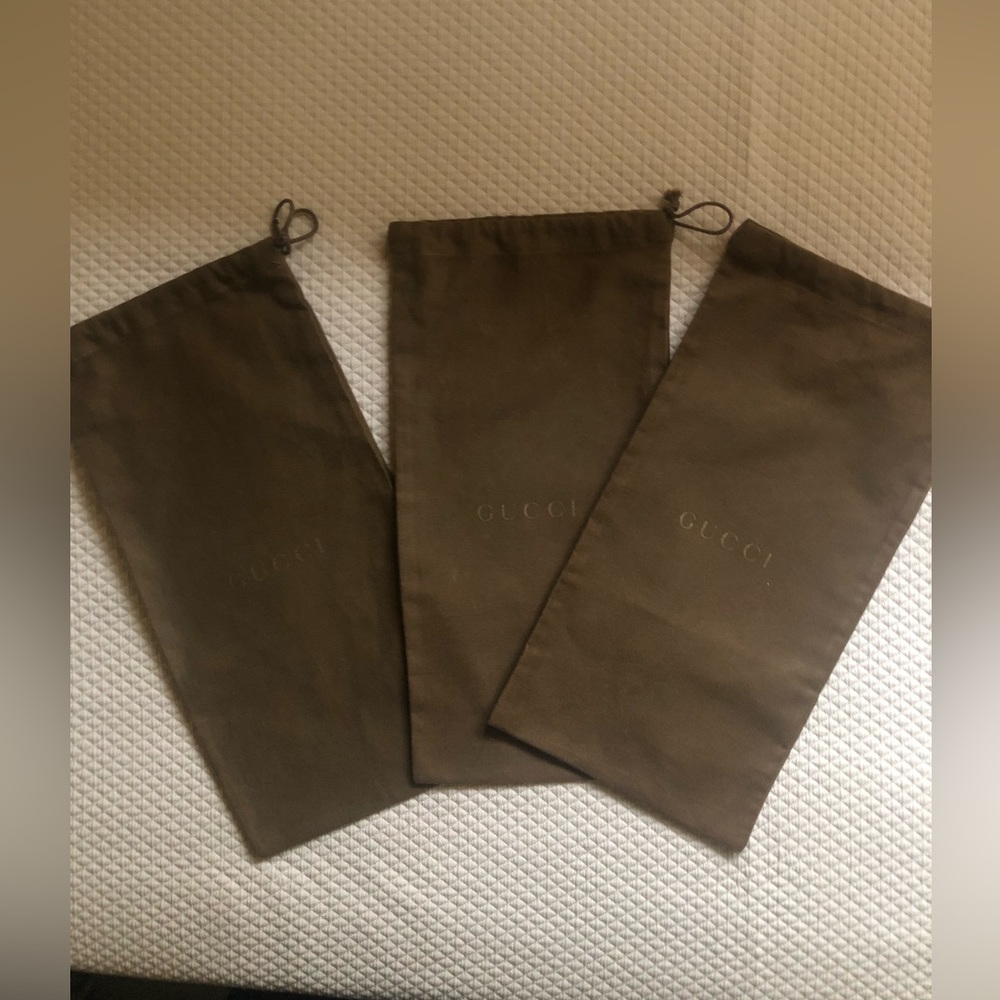 Gucci Shoe bags.